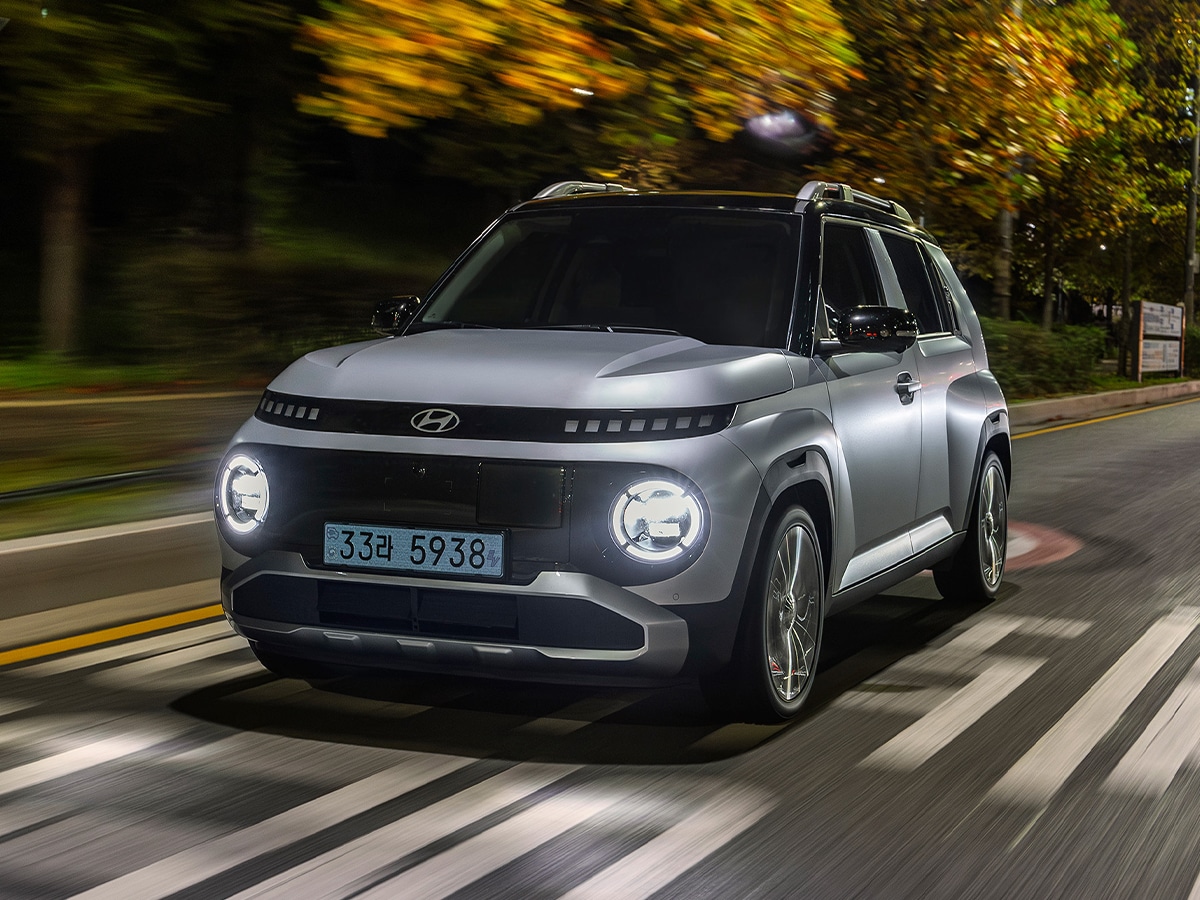 Hyundai Inster EV front three-quarter view on road