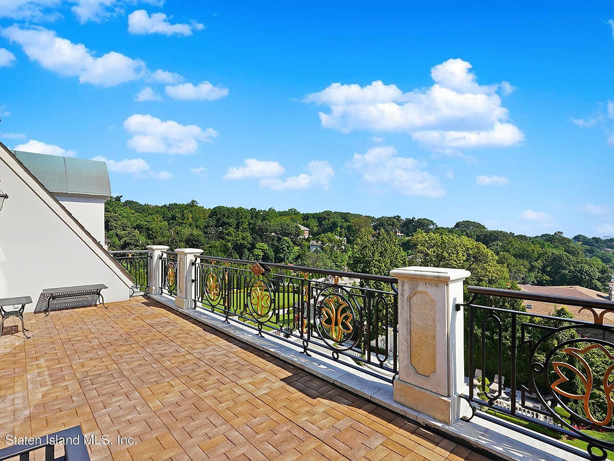 Paul castellano mega mansion balcony