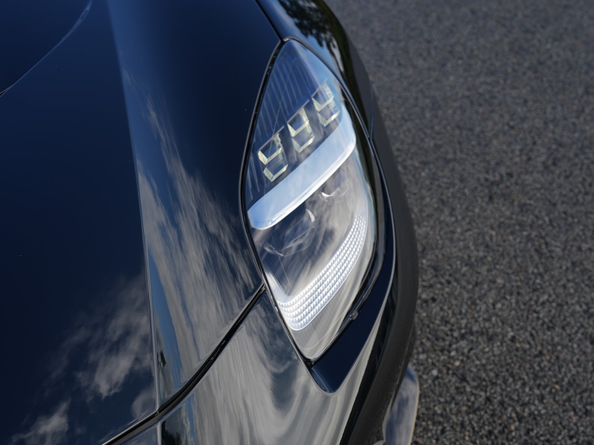2025 aston martin vanquish head light up close