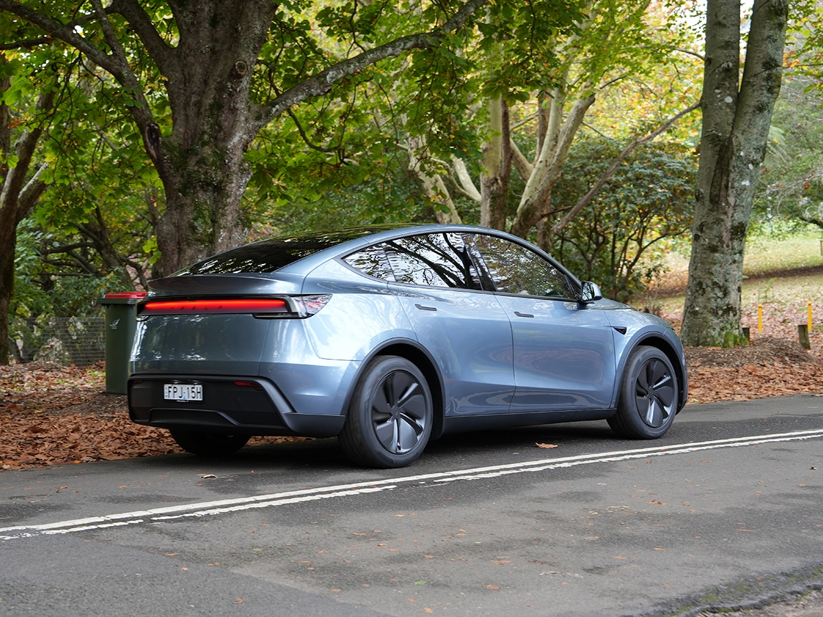 Tesla model y review on road drive rear end
