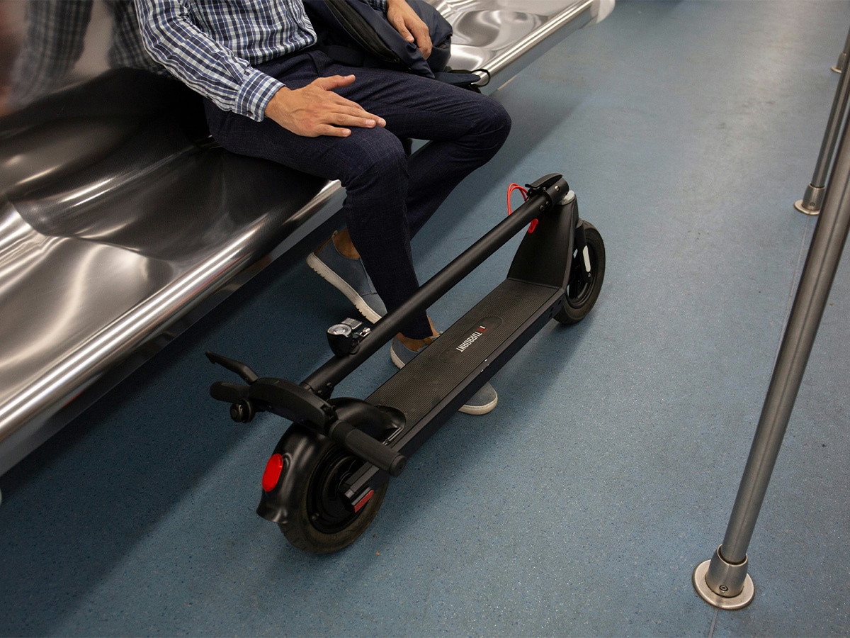 E scooter on train