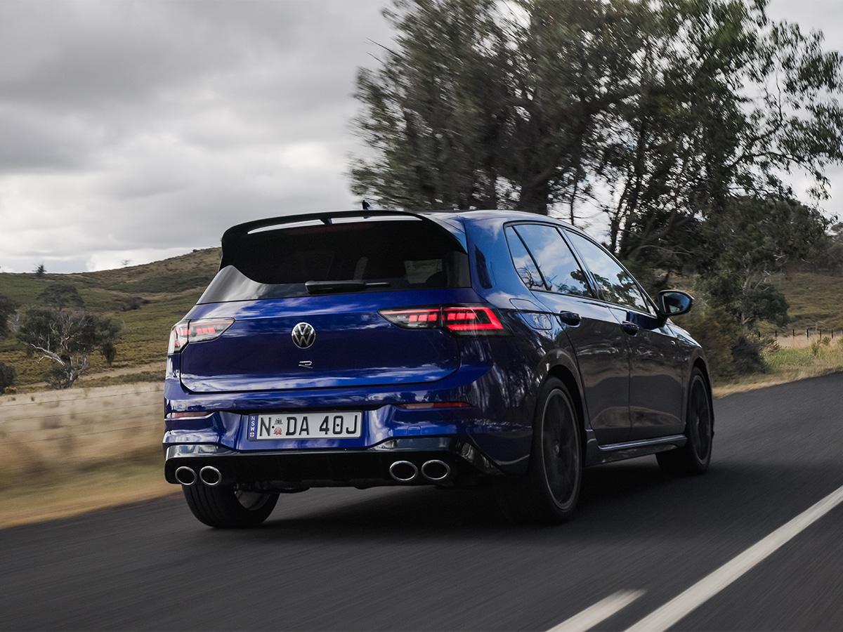 2025 golf r in lapiz blue on road