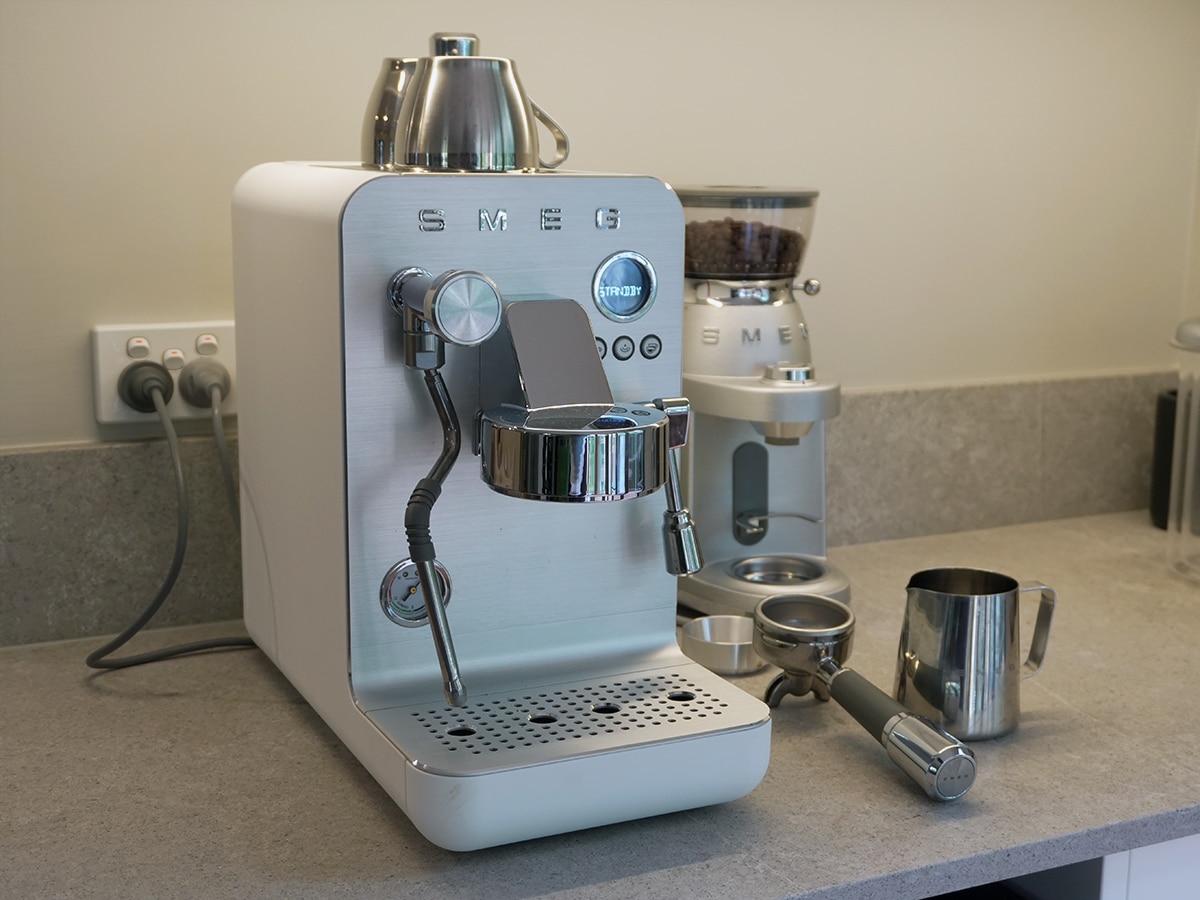 Smeg minipro espresso coffee machine on bench feature