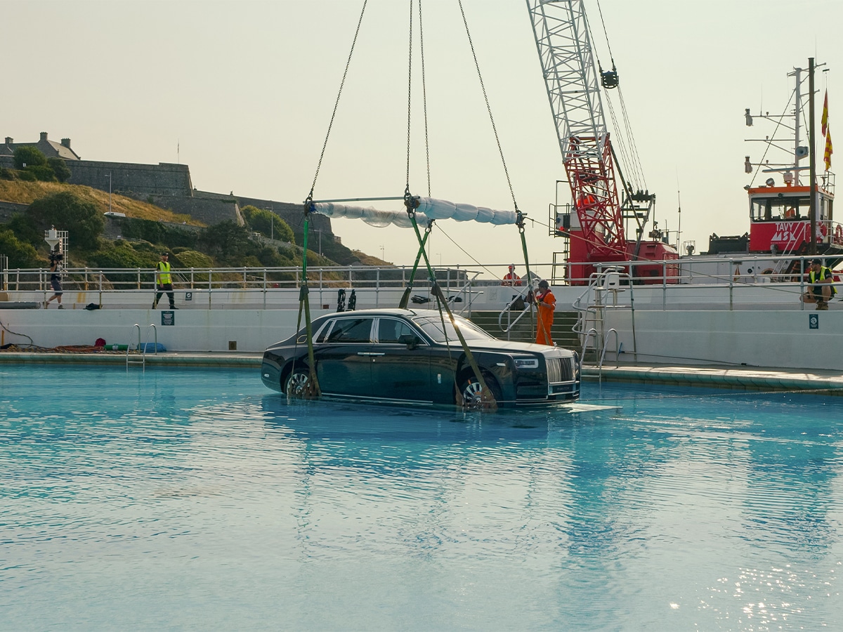 Rolls royce phantom extended in pool 8