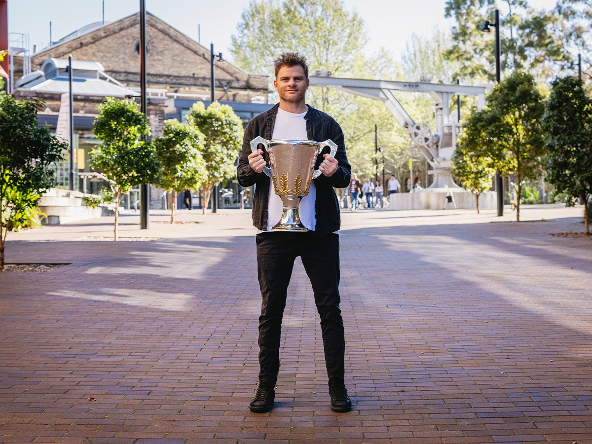 AFL Legend Heath Shaw with the 2025 AFL Premiership Cup | Image: Supplied
