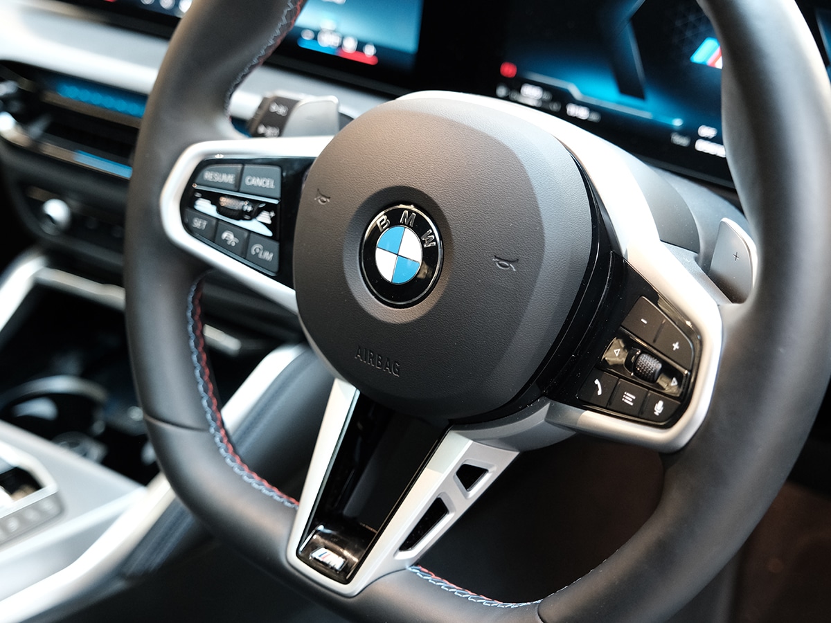 2025 bmw m240i brooklyn grey review steering wheel
