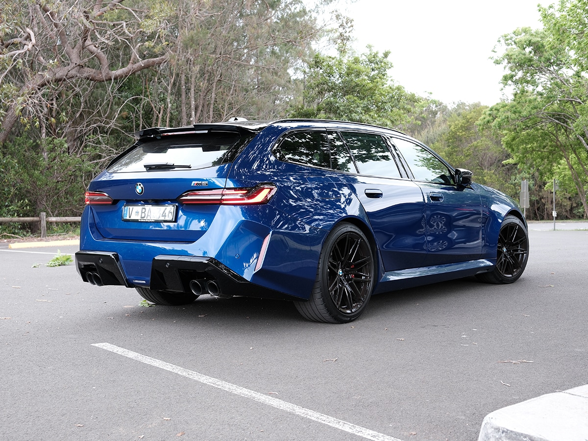 2025 bmw m5 touring review rear three quarter