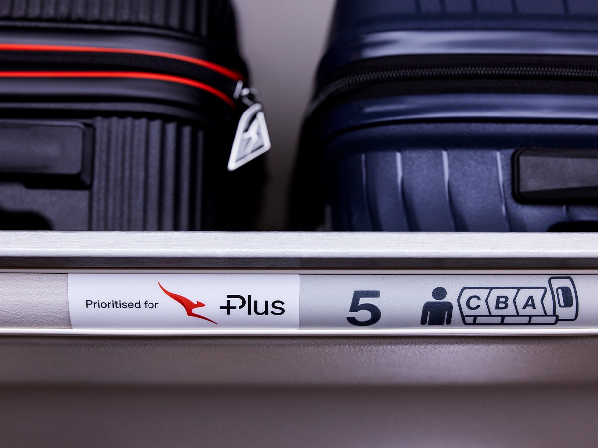 Qantas economy plus overhead