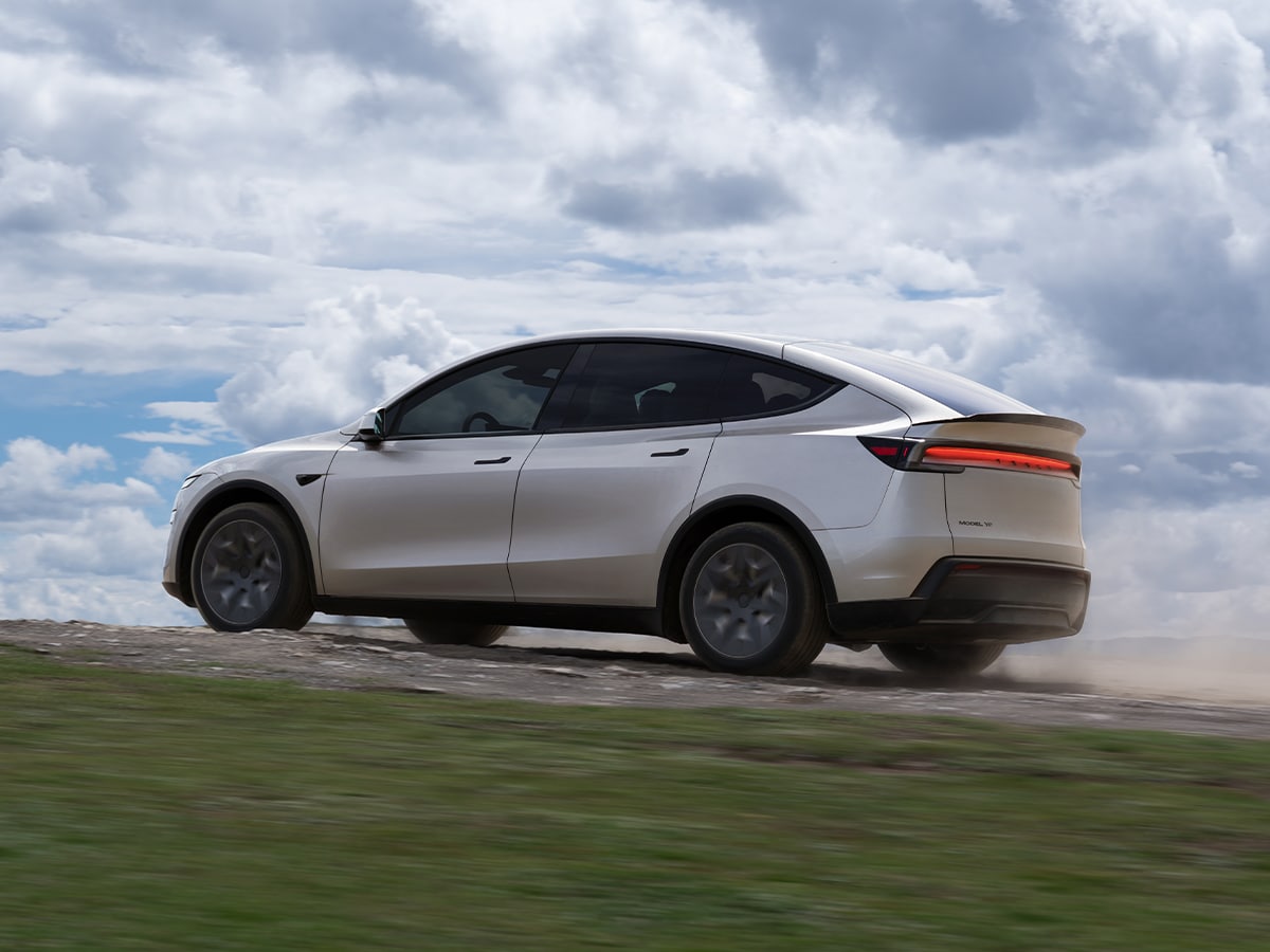 Tesla model y l rear three quarter