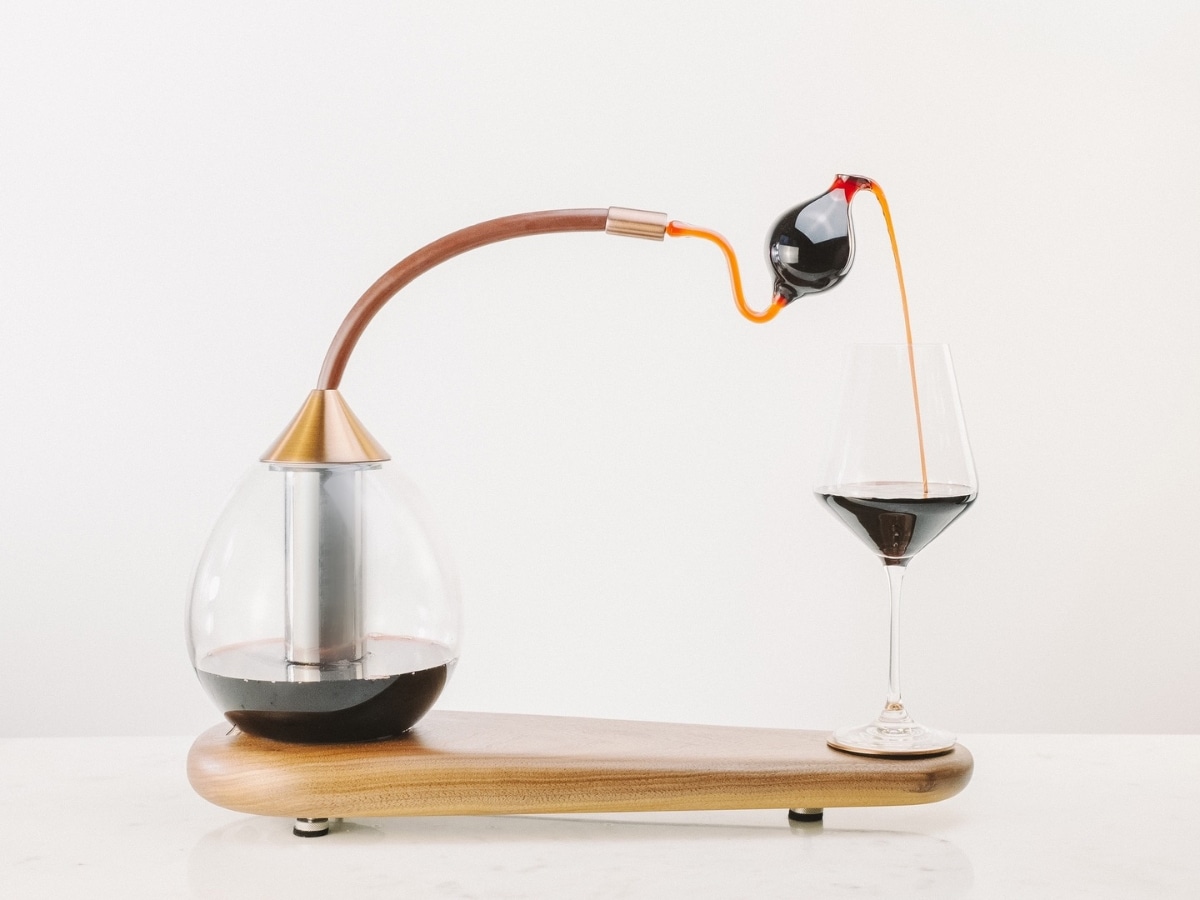 "Phoebe Pours" Kinetic Wine Pouring Sculpture | Image: Harvey & John