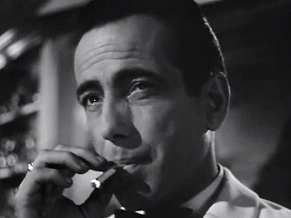 Humphrey bogart smoking a cigarette in casablanca 1