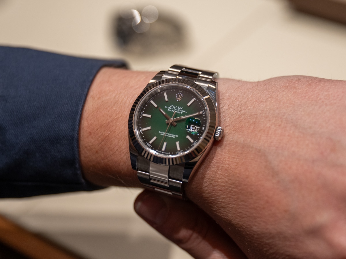 Rolex datejust on wrist green ombre