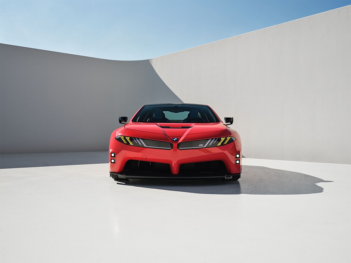 Red sports car with sharp angles and distinctive front design
