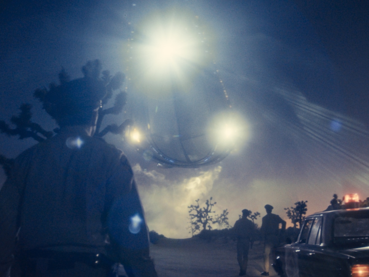 An eerie, atmospheric cinematic shot referencing Roswell in Spielberg's Disclosure Day