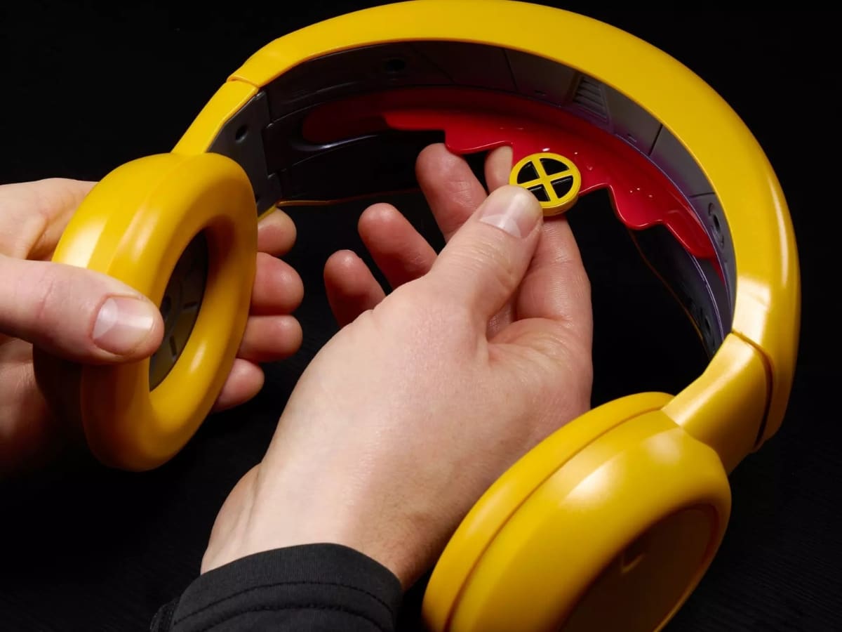 Profile of the light up Cyclops visor showing the activation button and spring-loaded earpieces