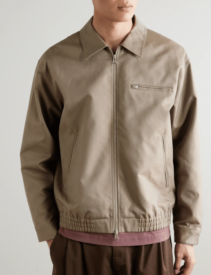 "Model showcasing the NN07 Gideon organic cotton-twill blouson jacket, paired with tailored trousers.