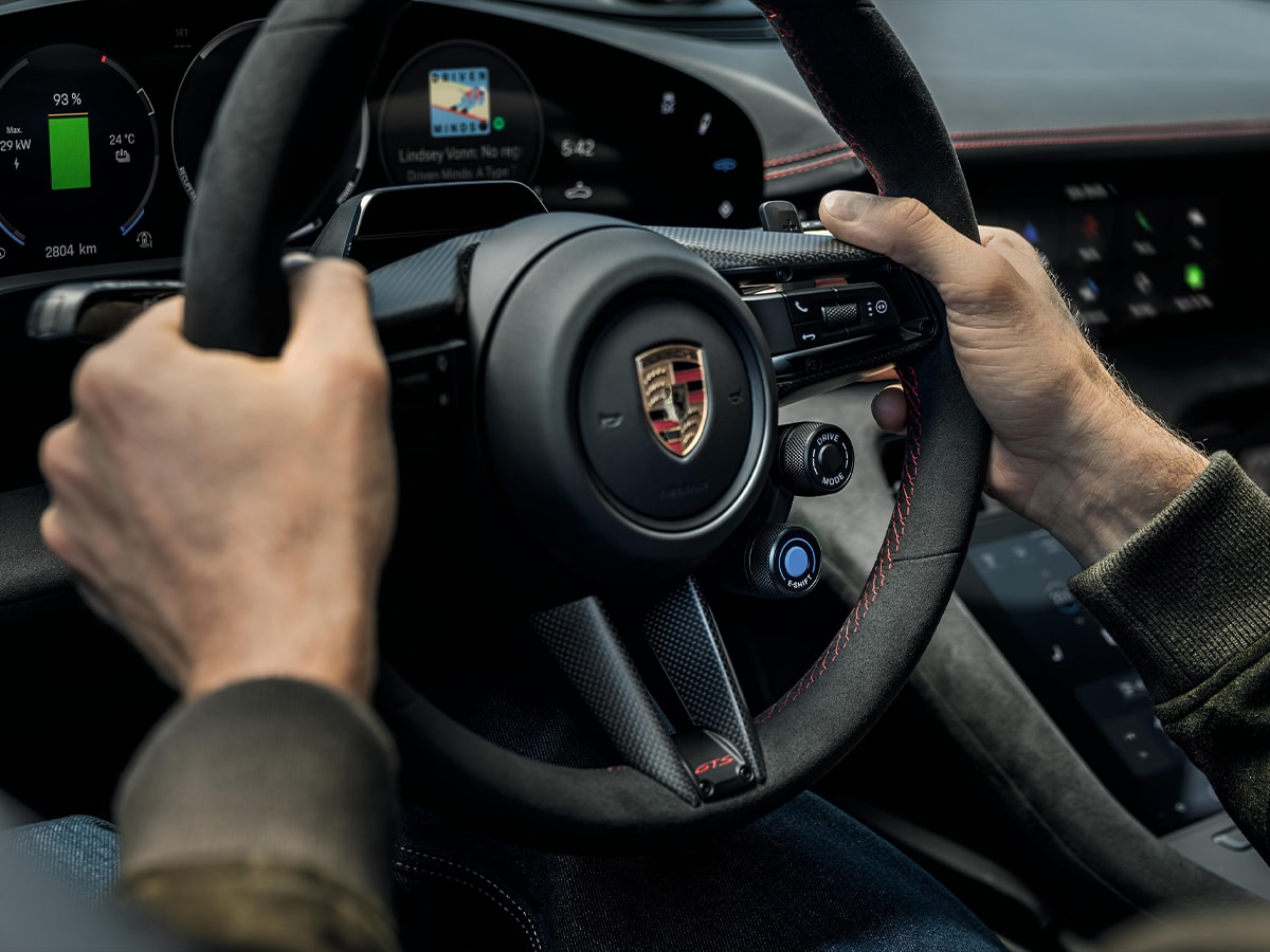 Porsche e shift hands on steering wheel