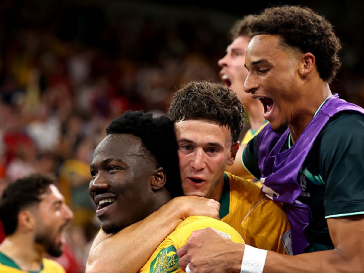 Nestory Irankunda and Connor Metcalfe celebrate a goal for the Socceroos at the 2026 FIFA World Cup.