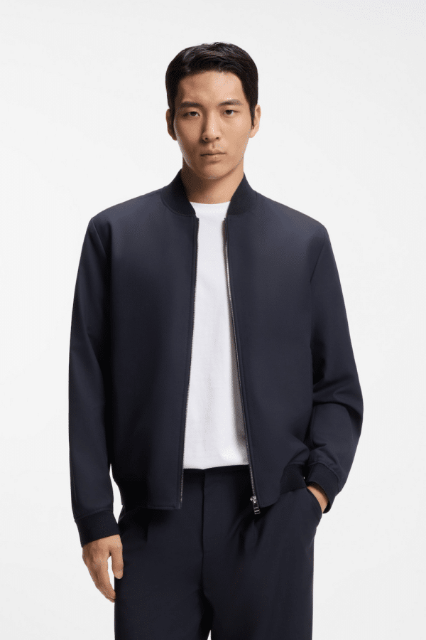 Hugo Boss slim-fit dark blue blouson jacket in a machine-washable stretch wool blend for daily corporate wear.