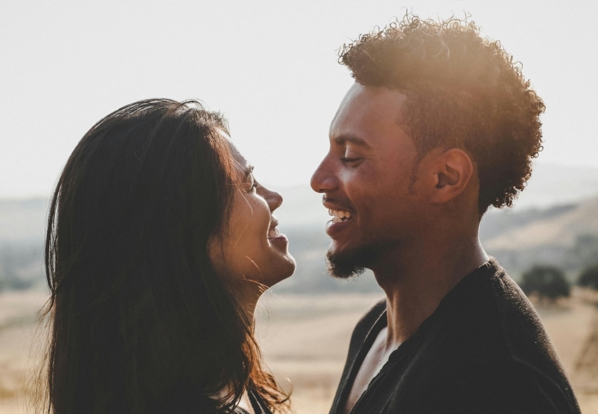 Man and woman smiling at each other