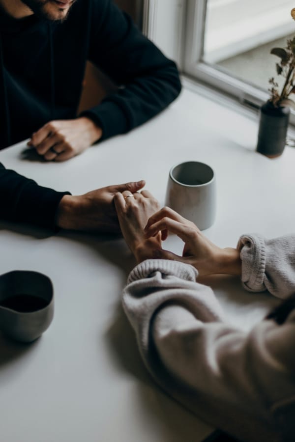 Relationship male and female holding hands