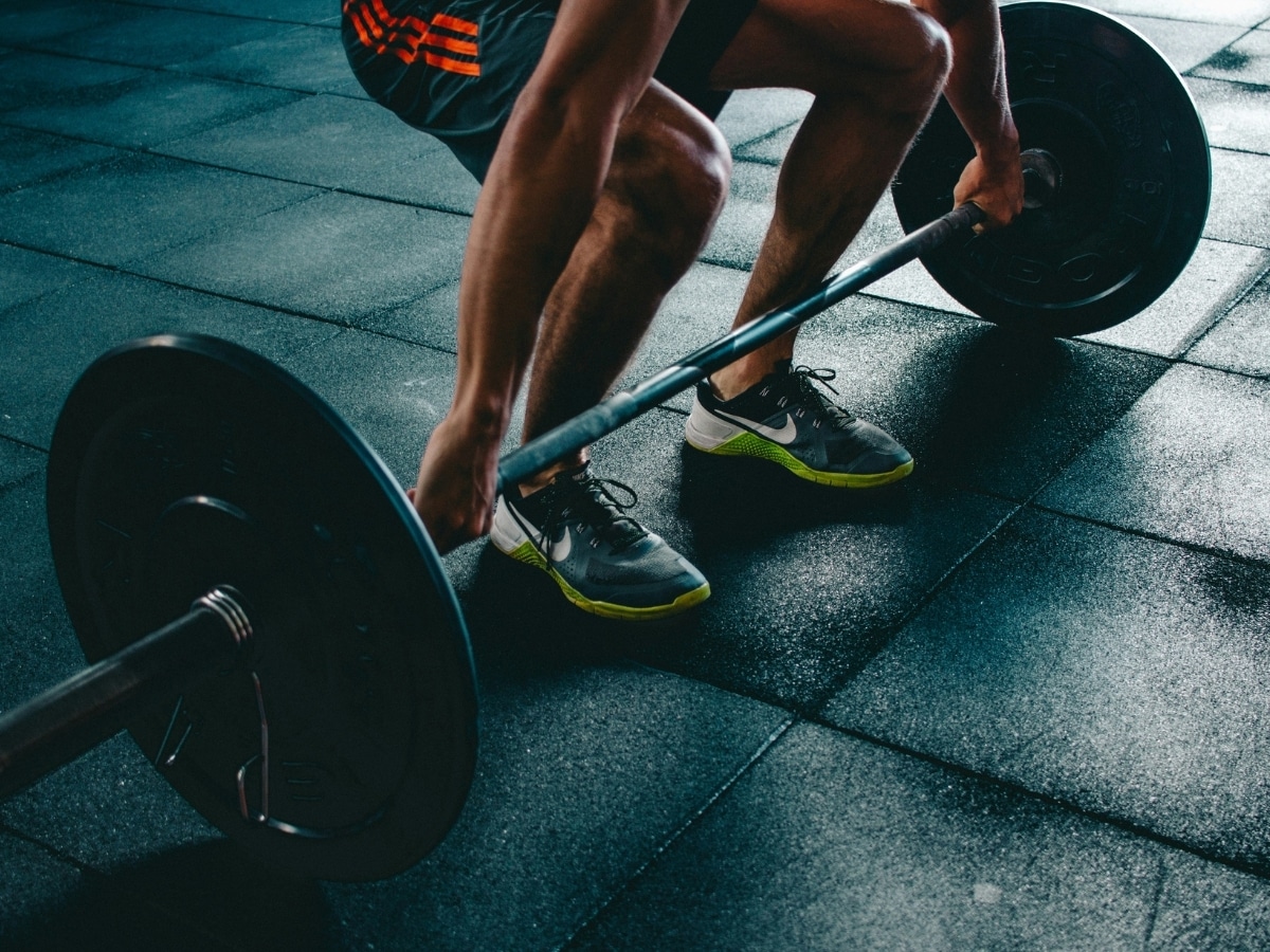 A man lifting weights at the gym