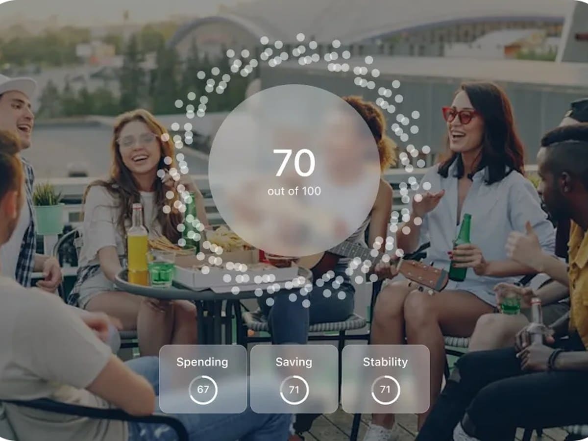 Wingman Financial Health Score of 70 out of 100 overlaid on a group of friends at a rooftop dinner