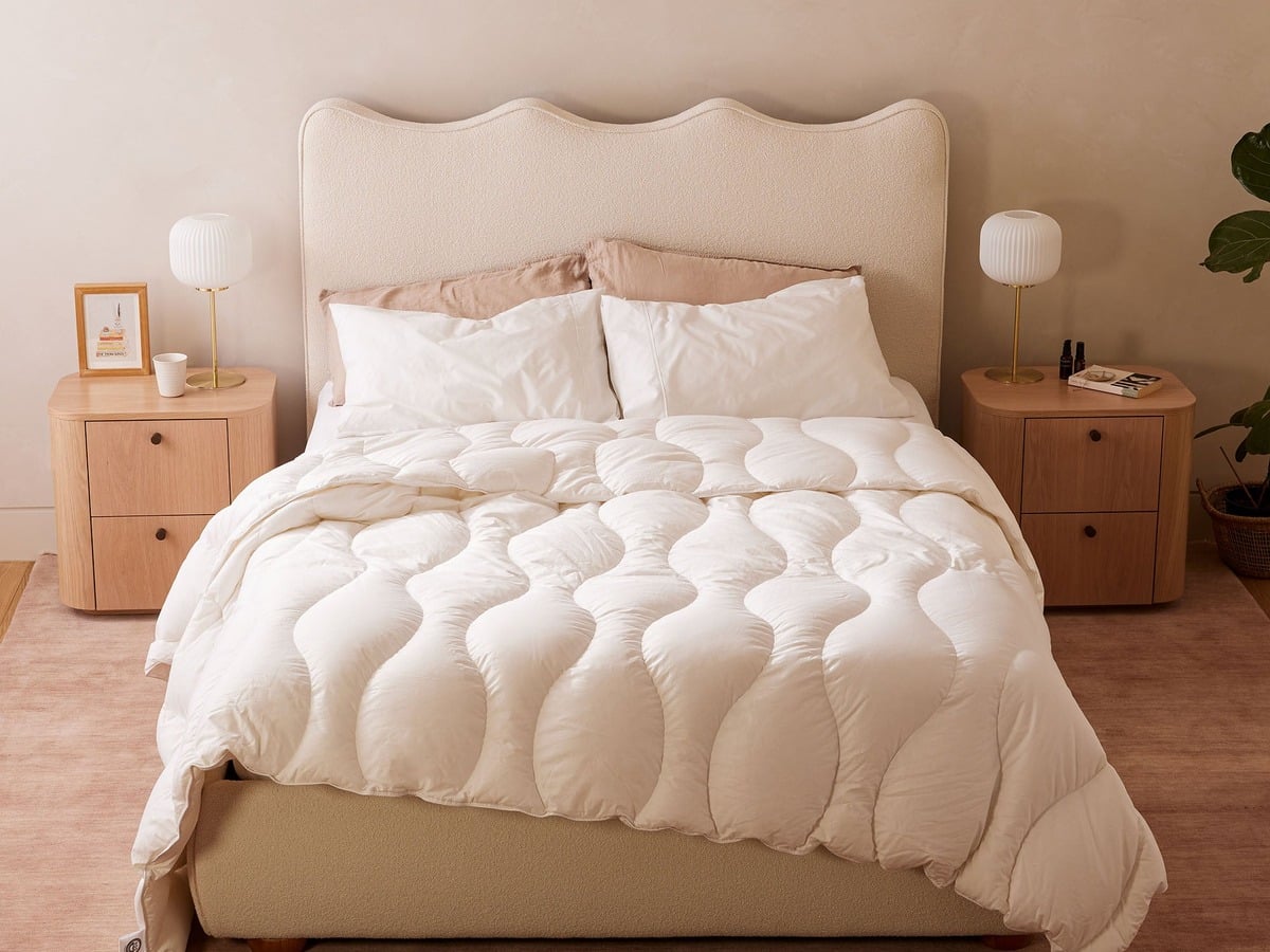 The Bonny All Rounder Quilt on a bed showing the signature Wave stitching