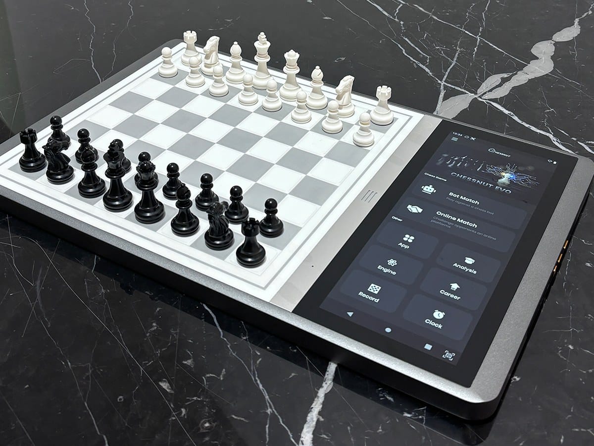 Chessnut Evo AI chess board with 12.3 inch display on a marble table