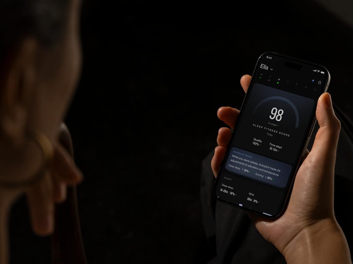 The Eight Sleep app open on a phone showing a nightly Sleep Fitness Score