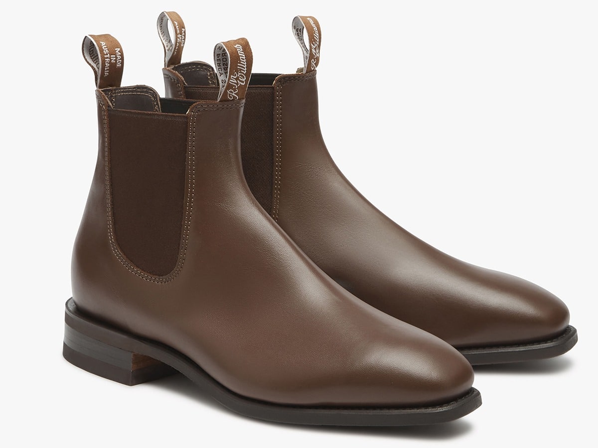 Brown leather Chelsea boots with elastic side panels and pull tabs