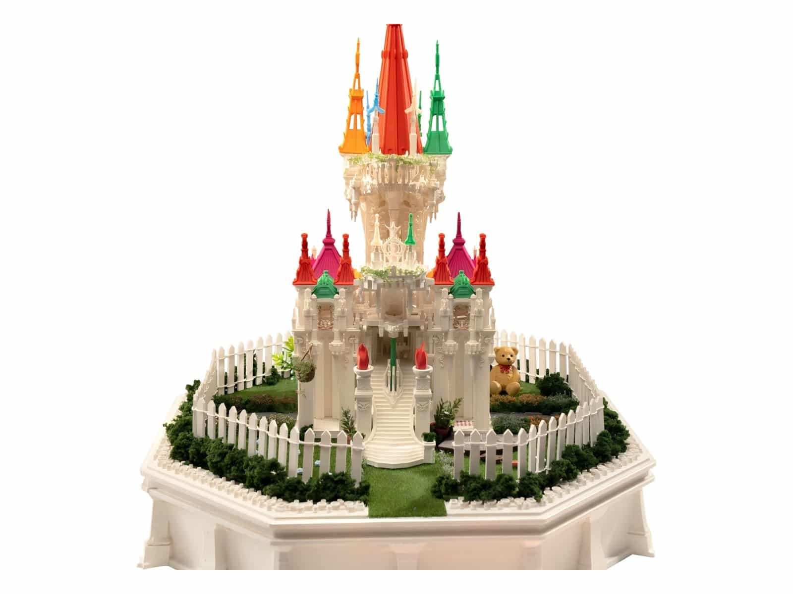 A multi-colour printed castle model with spires in red, orange and green