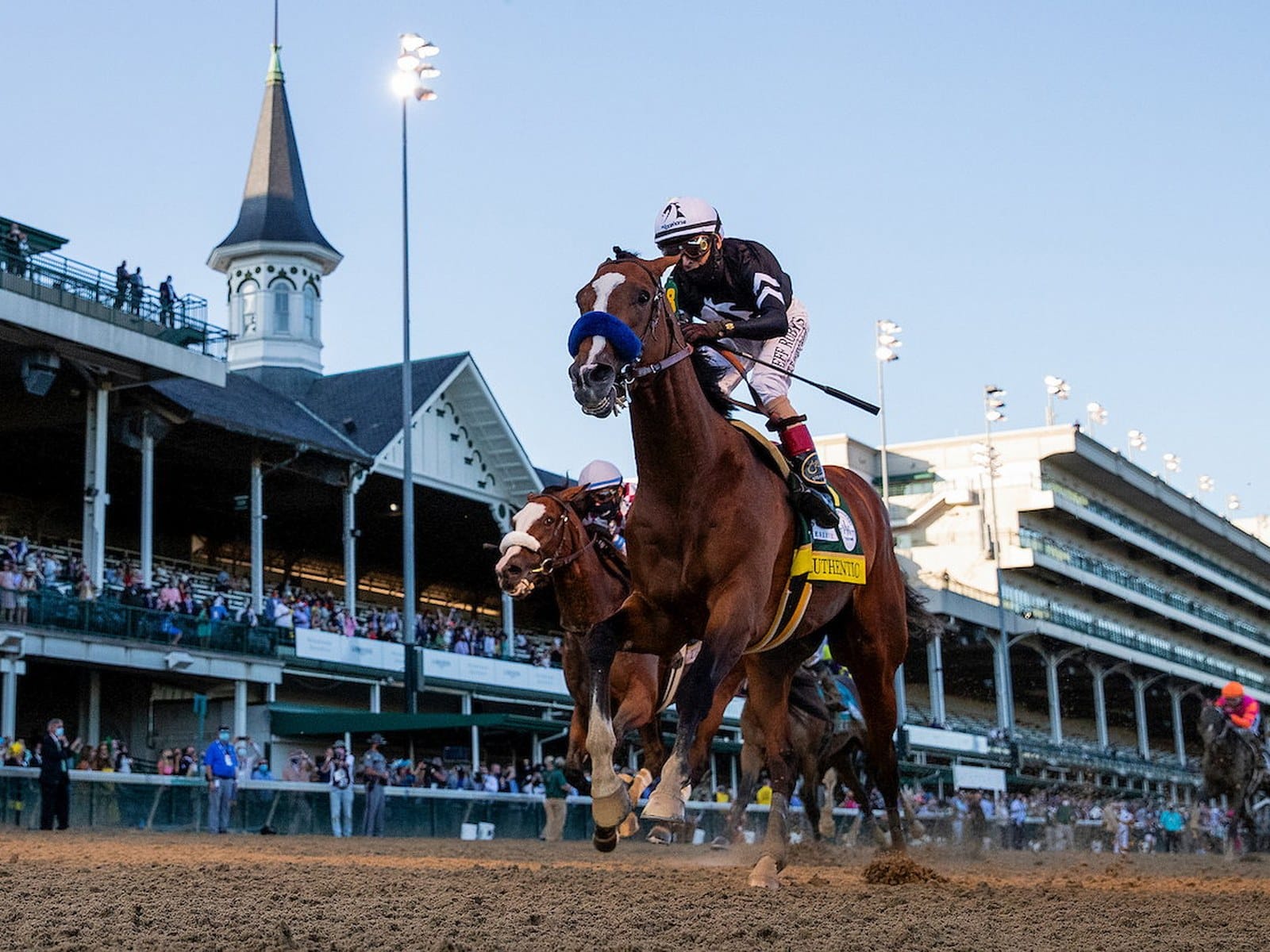 Authentic and jockey John Velazquez run clear of the field past the Churchill Downs twin spires to win the 2020 Kentucky Derby.