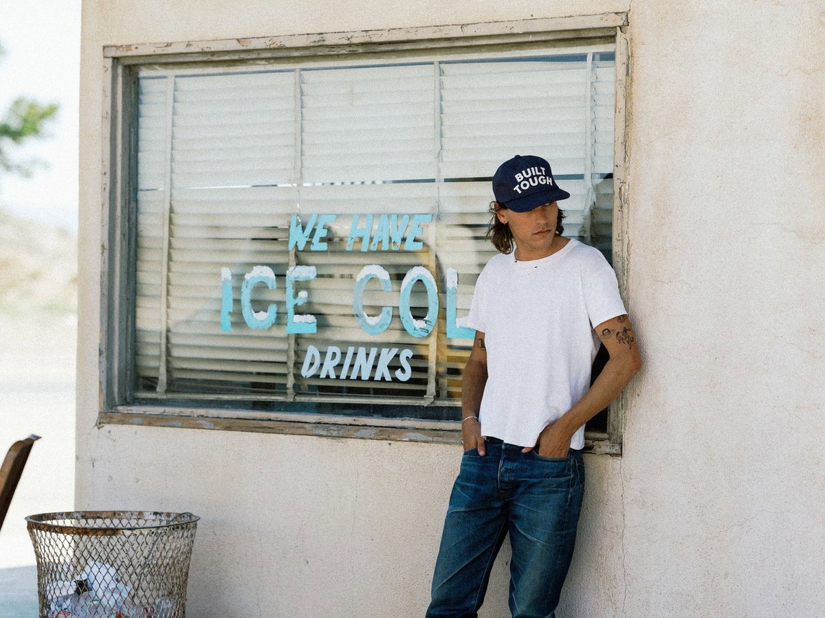 Brixton x Ford apparel and headwear laid out together, featuring Ford Blue tones and racing stripe graphics (4 of 6)