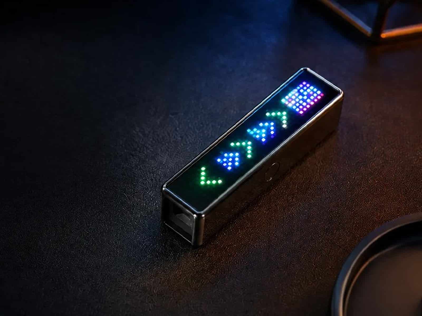 EDC FB1 Close-up of the EDC FB1 in hand, highlighting the slider mechanism and light patterns