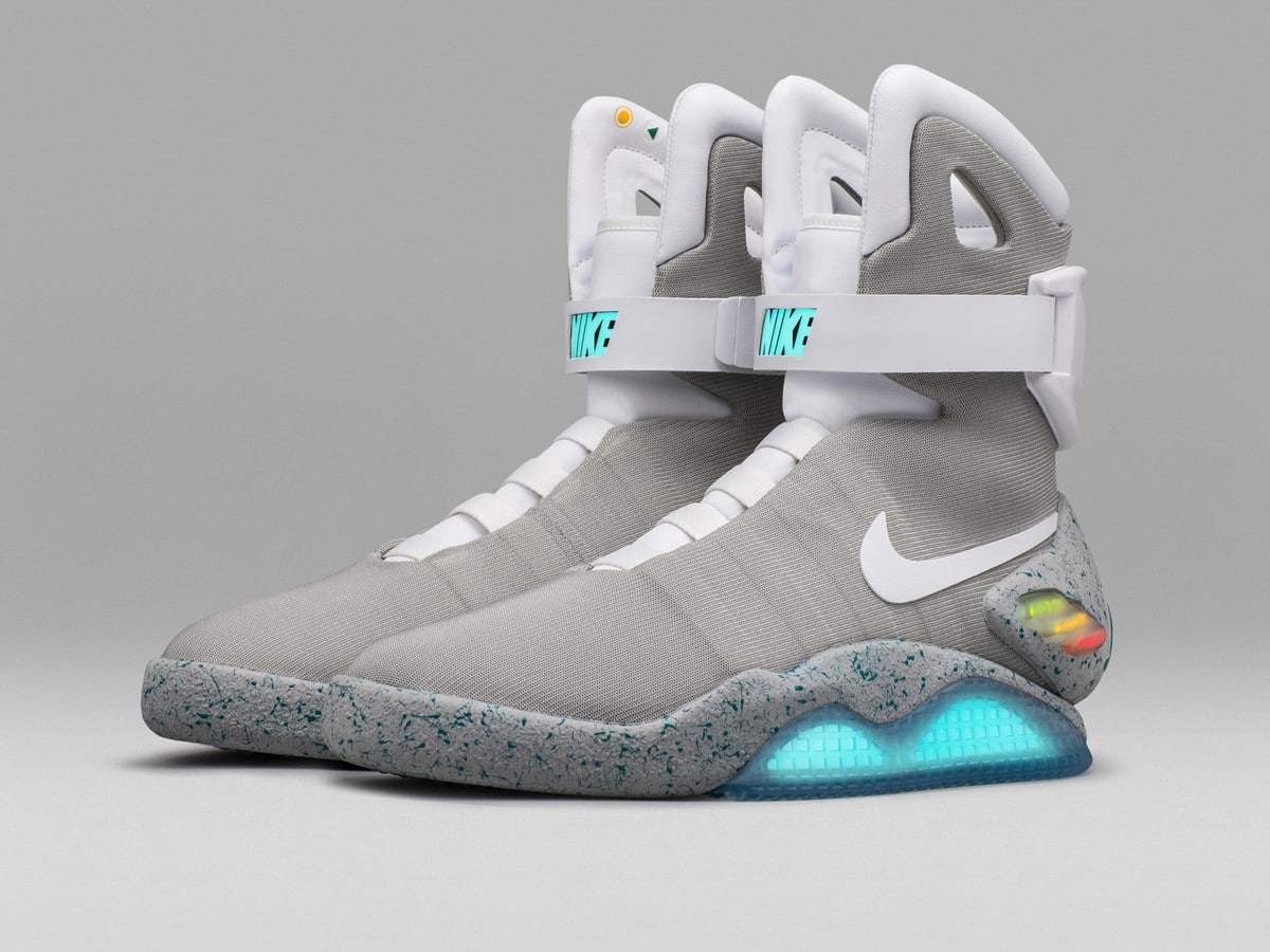 The 2016 Nike MAG Back to the Future self-lacing shoes with white power laces and glowing blue outsoles