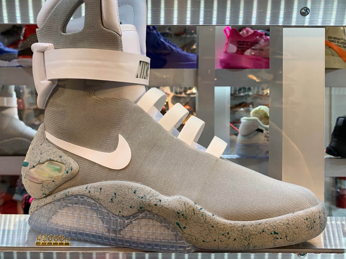 A Nike MAG Back to the Future shoe on display at Flight Club Miami beside a US$45,000 price tag