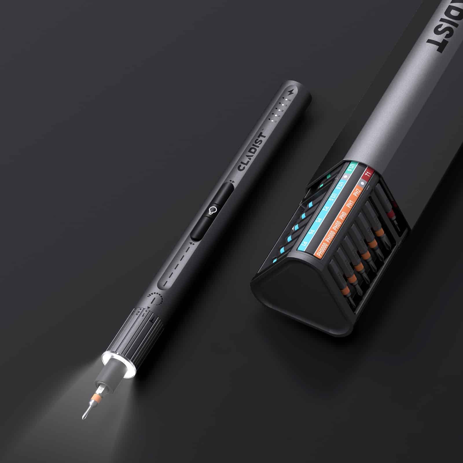 Cladist Titan electric screwdriver photographed on a dark background with its four LEDs lit around the bit tip and the bit case behind it