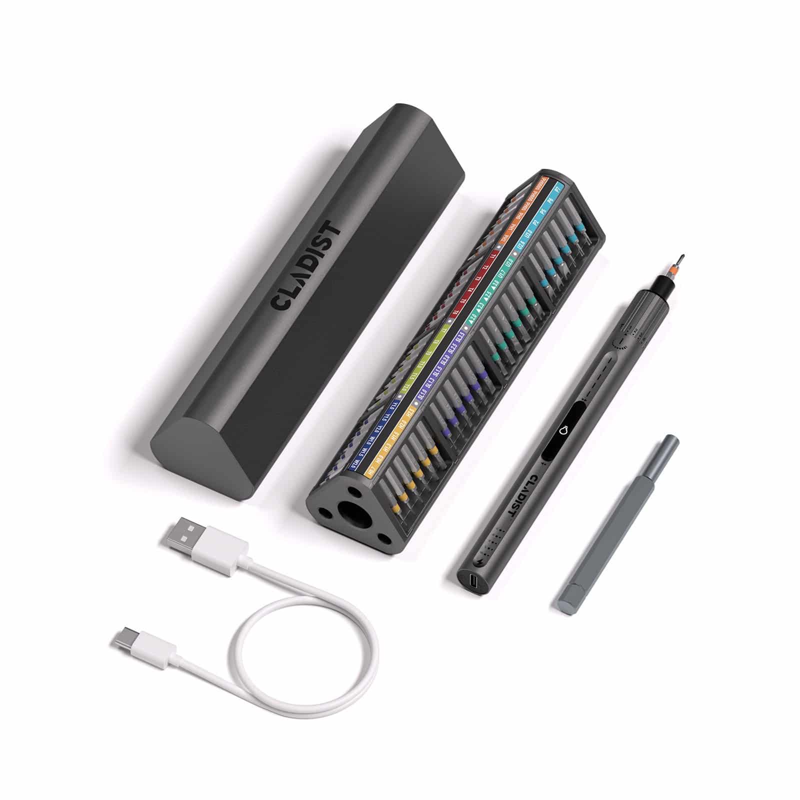 Cladist Titan driver, aluminium pop-up bit case, spare bit holder and USB-C charging cable arranged on a white background