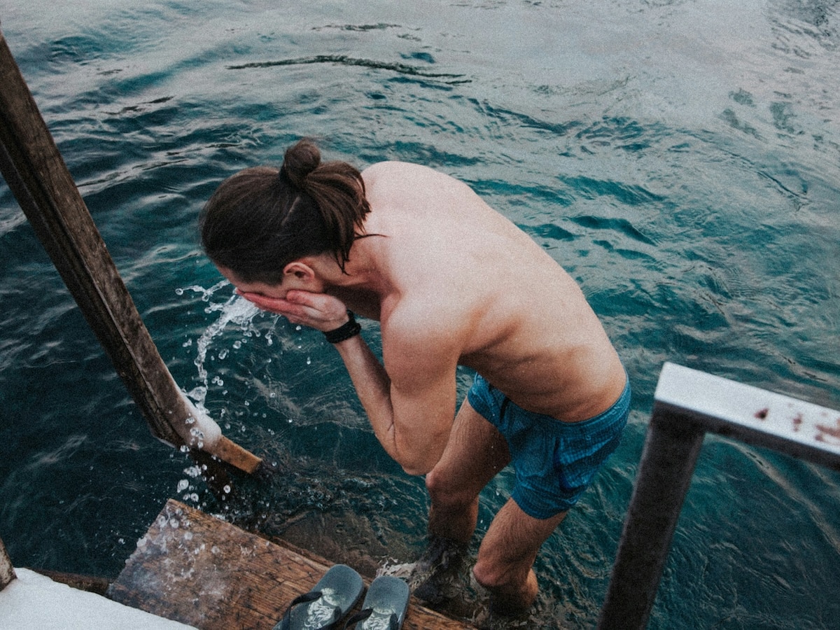 Man ocean winter swimming