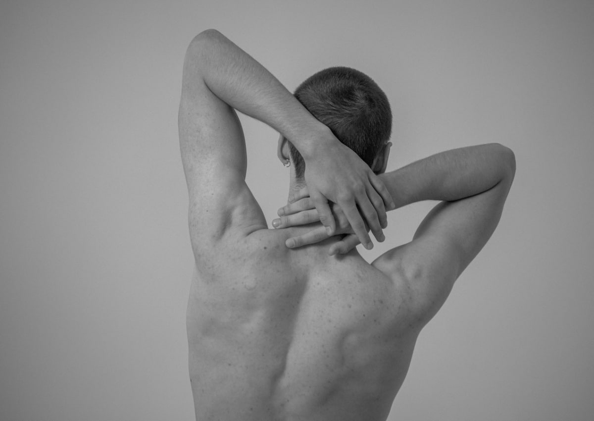 Man stretching good posture