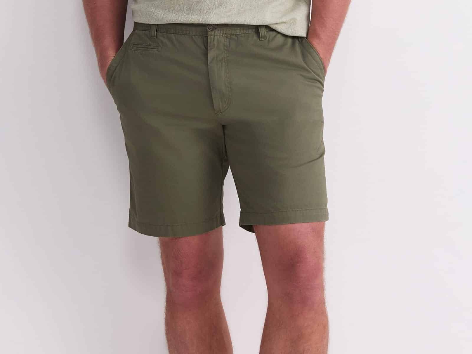 A man wearing the Sportscraft Classic Short in Khaki with suede loafers