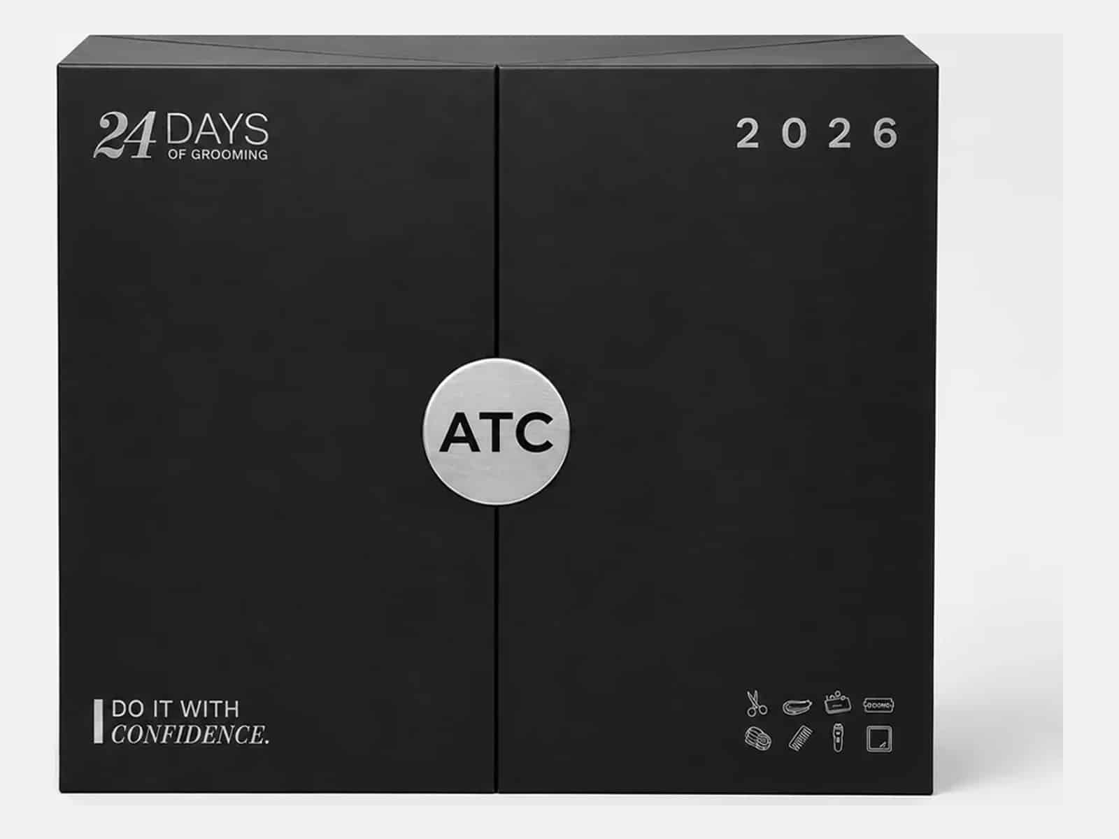 The closed black Above The Collar 24 Days of Grooming 2026 advent calendar box with a brushed silver ATC medallion on the front.