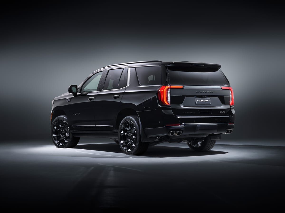 Yukon denali signature black rear three quarter