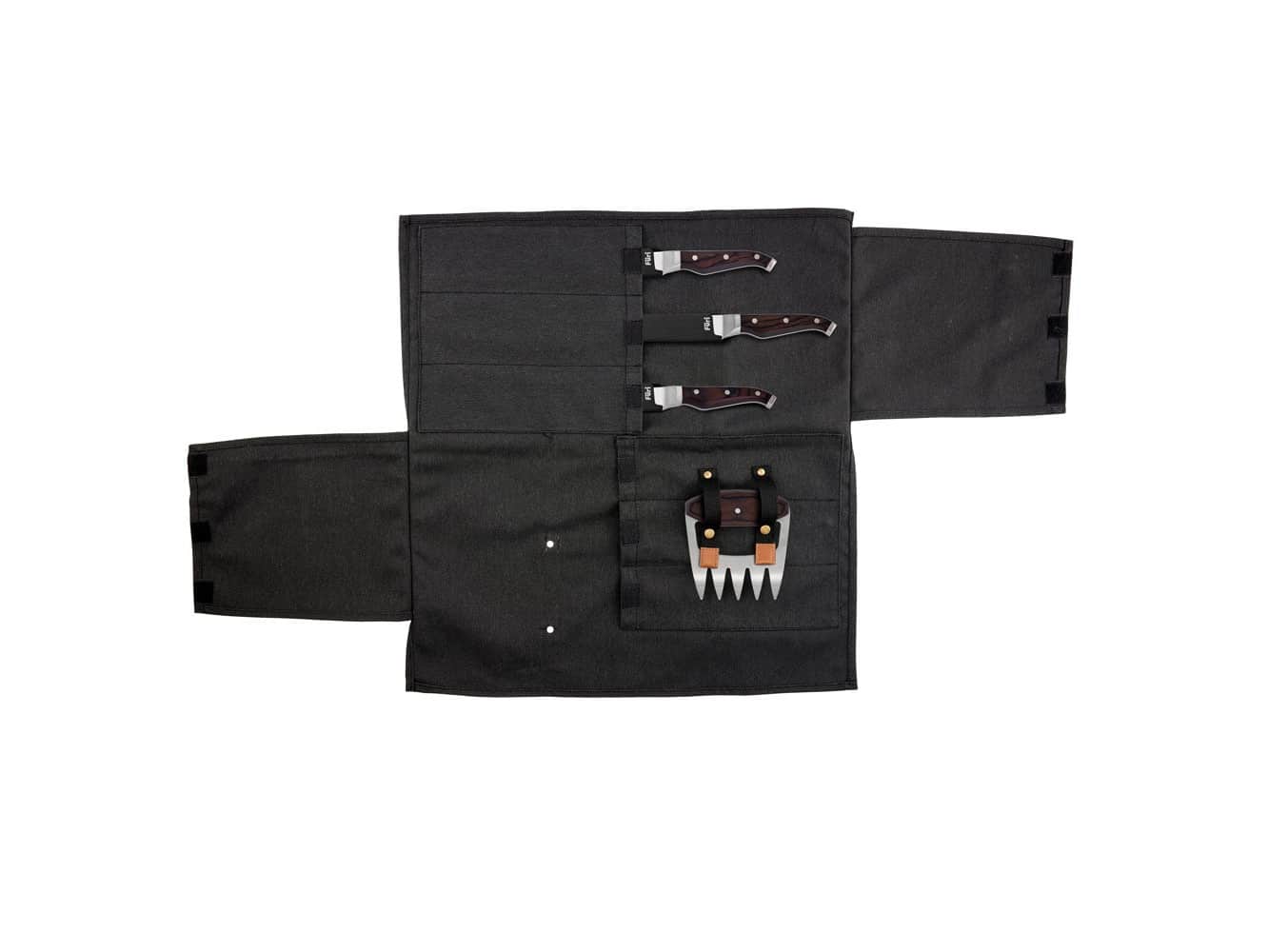 The Furi six-pocket knife roll opened flat with three Triple Rivet knives and the meat claw held in its pockets