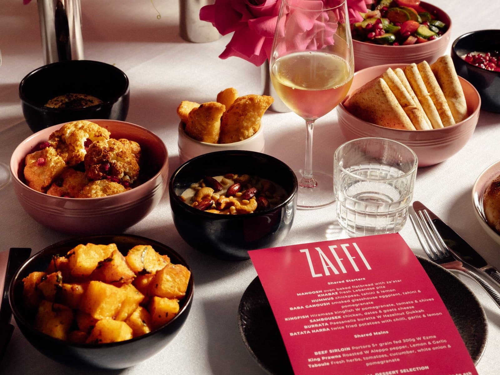 A Middle Eastern sharing feast across a table at Zaffi Sydney, with flatbreads, mezze and cocktails set for a Saturday bottomless brunch. (4 of 4)