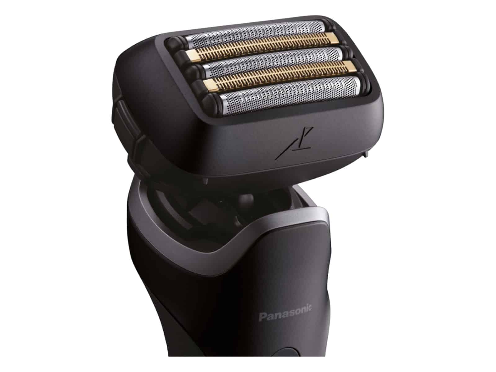 Close-up of the Panasonic Series 900 PRO flexible shaving head with its silver foils and gold-toned stubble blades