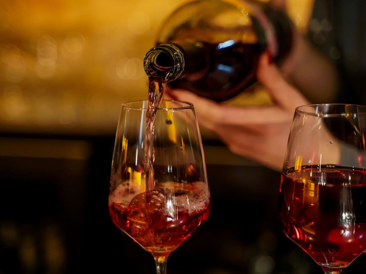 Cheersing chilled red wine